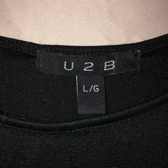 Sleeveless Peplum Top - Picture 2 of 2